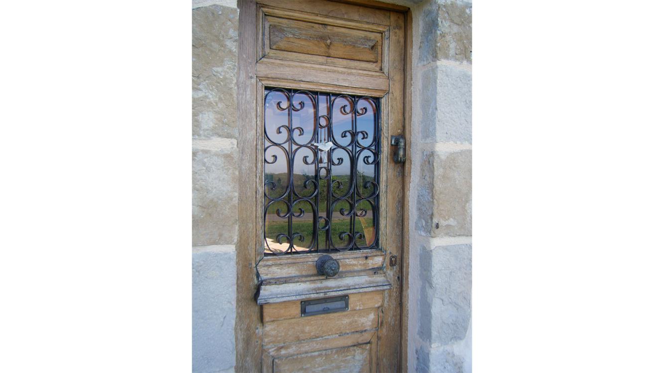 Grille de défense de porte